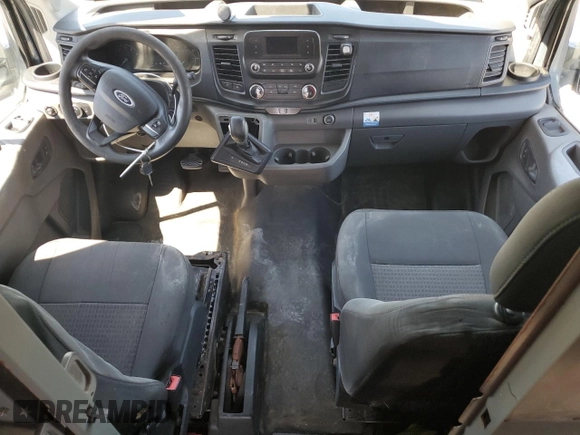 2020 Ford Transit Cargo with VIN 1FTBR3X85LKA72249, listed as a Copart auction lot 56999805 with 68,201 mi miles and Salvage Title. Bid and sale history available at DreamBid. Image 8.