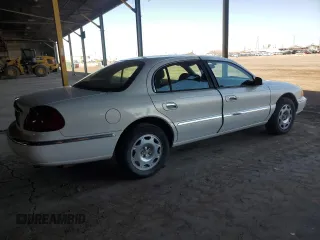 2001 Lincoln Continental with VIN 1LNHM97V31Y622782, listed as a Copart auction lot 74023344 with 116,672 mi miles and Salvage Title. Bid and sale history available at carsss.com. Image 3.