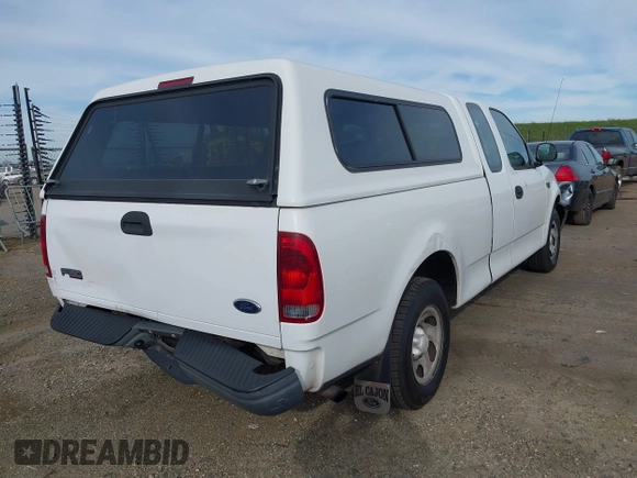 2002 Ford F-150 XL with VIN 1FTRX17222NB82564, listed as a IAAI auction lot 41701719 with 1 mi miles. Bid and sale history available at carsss.com. Image 4.