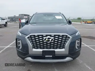 2021 Hyundai Palisade SEL with VIN KM8R4DHE0MU205427, listed as a IAAI auction lot 42436615 with 53,759 mi miles and . Bid and sale history available at DreamBid. Image 12.