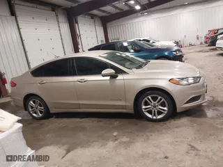 2018 Ford Fusion Hybrid S with VIN 3FA6P0UU5JR100377, listed as a IAAI auction lot 41300284 with 108,936 mi miles. Bid and sale history available at carsss.com. Image 13.