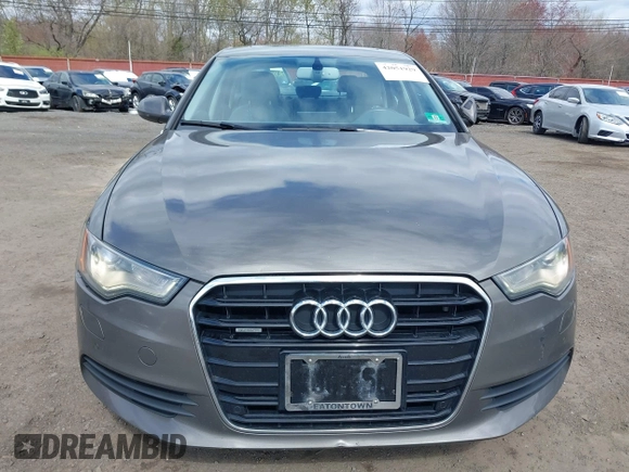 2013 Audi A6 Premium Plus z VIN WAUGGAFC1DN038375, wystawiony jako IAAI lot #42051929 z przebiegiem 118 181 mil mil oraz . Historia ofert i sprzedaży dostępna na DreamBid. Obrazek 12.