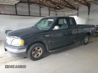 1999 Ford F-150 z VIN 1FTZX1723XNA24144, wystawiony jako Copart lot #58071155 z przebiegiem 320 829 mil mil oraz Szkoda całkowita • Salvage title. Historia ofert i sprzedaży dostępna na DreamBid. Obrazek 1.
