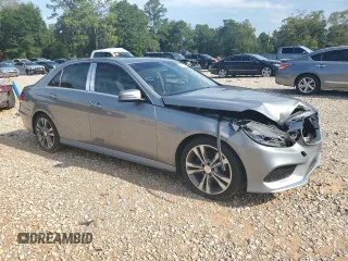 2014 Mercedes-Benz E 350 Sport with VIN WDDHF5KB5EB047443, listed as a Copart auction lot 61970945 with 119,998 mi miles and Salvage title. Bid and sale history available at DreamBid. Image 4.