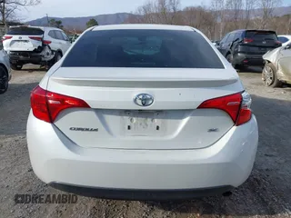 2017 Toyota Corolla L z VIN 5YFBURHE5HP633791, wystawiony jako IAAI lot #41426630 z przebiegiem 99 450 mil mil oraz . Historia ofert i sprzedaży dostępna na DreamBid. Obrazek 17.