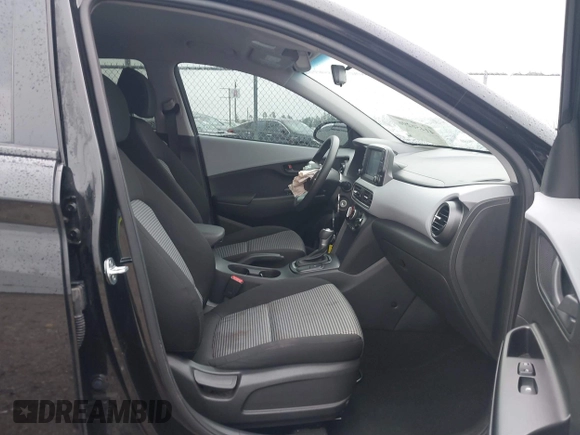 2018 Hyundai Kona SE with VIN KM8K12AA7JU128279, listed as a IAAI auction lot 41456296 with 100,977 mi miles and . Bid and sale history available at DreamBid. Image 5.
