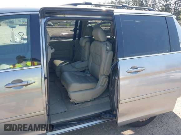 2009 Honda Odyssey EX-L with VIN 5FNRL38779B013943, listed as a IAAI auction lot 42119422 with 147,285 mi miles. Bid and sale history available at carsss.com. Image 6.