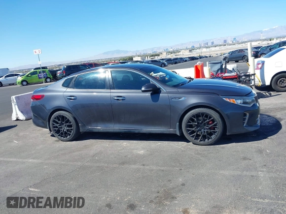 2016 Kia Optima SX Turbo with VIN 5XXGW4L29GG091635, listed as a IAAI auction lot 41884813 with 121,764 mi miles and . Bid and sale history available at carsss.com. Image 13.