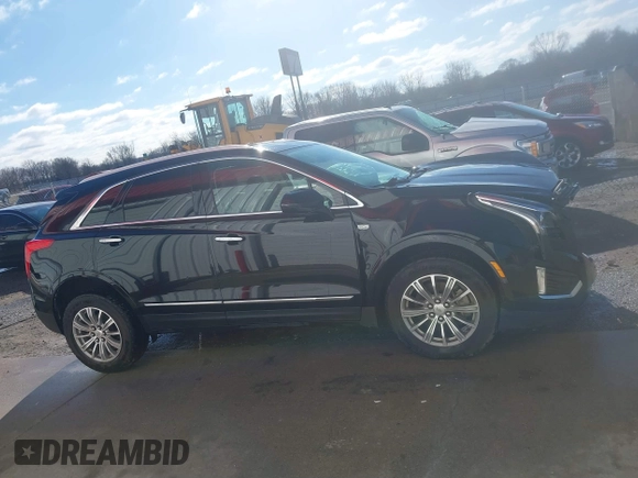 2017 Cadillac XT5 Luxury FWD with VIN 1GYKNBRS5HZ164209, listed as a IAAI auction lot 41213572 with 144,039 mi miles. Bid and sale history available at carsss.com. Image 13.