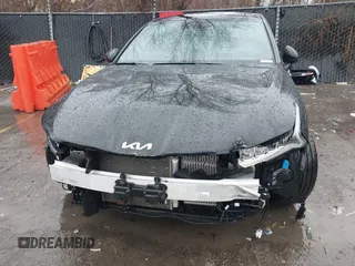 2022 Kia K5 GT-Line z VIN 5XXG64J20NG155965, wystawiony jako IAAI lot #41642454 z przebiegiem 29 647 mil mil oraz . Historia ofert i sprzedaży dostępna na DreamBid. Obrazek 6.