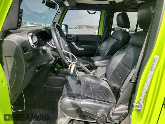 2012 Jeep Wrangler Unlimited Call of Duty MW3 z VIN 1C4BJWFG4CL242211, wystawiony jako Copart lot #59774555 z przebiegiem 117 463 mil mil oraz Szkoda całkowita • Salvage title. Historia ofert i sprzedaży dostępna na DreamBid. Obrazek 7.