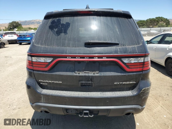 2014 Dodge Durango Citadel with VIN 1C4RDJEG5EC394396, listed as a Copart auction lot 61416305 with 185,730 mi miles and Salvage title. Bid and sale history available at DreamBid. Image 6.