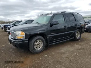 2003 GMC Yukon Denali z VIN 1GKEK63U43J263449, wystawiony jako Copart lot #53848345 z przebiegiem 144 280 mil mil oraz Szkody całkowita. Historia ofert i sprzedaży dostępna na DreamBid. Obrazek 1.