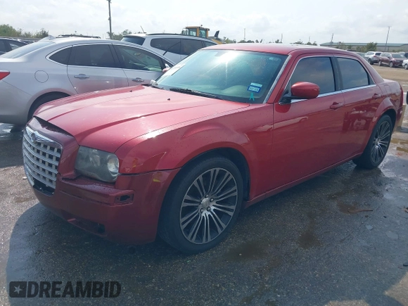 2010 Chrysler 300 with VIN 2C3CA2CV3AH279913, listed as a IAAI auction lot 40731536 with 143,969 mi miles. Bid and sale history available at carsss.com. Image 2.