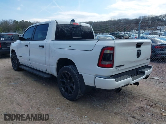2023 Ram 1500 Laramie with VIN 1C6SRFJT8PN520610, listed as a IAAI auction lot 41898526 with 23,605 mi miles and . Bid and sale history available at DreamBid. Image 3.
