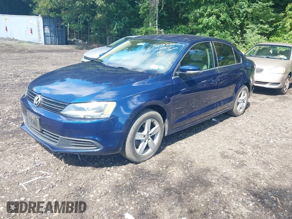2014 Volkswagen Jetta TDI w/Premium/Nav with VIN 3VWLL7AJ3EM232789, listed as a IAAI auction lot 42737539 with 60,263 mi miles and . Bid and sale history available at DreamBid. Image 2.
