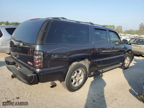 2004 GMC Yukon XL Denali with VIN 1GKFK66U54J262196, listed as a Copart auction lot 69614124 with 244,976 mi miles and Salvage Title. Bid and sale history available at carsss.com. Image 3.