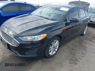 2020 Ford Fusion Hybrid SE with VIN 3FA6P0LU3LR113987, listed as a IAAI auction lot 41778511 with 67,509 mi miles. Bid and sale history available at carsss.com. Image 2.