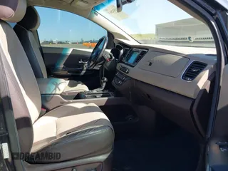 2016 Kia Sedona SX-L with VIN KNDME5C15G6083811, listed as a IAAI auction lot 41932863 with 124,218 mi miles. Bid and sale history available at carsss.com. Image 5.