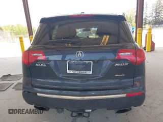 2011 Acura MDX with VIN 2HNYD2H22BH532772, listed as a IAAI auction lot 42109637 with 89,712 mi miles. Bid and sale history available at carsss.com. Image 16.