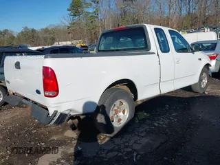 1999 Ford F-150 with VIN 1FTZX1728XNA81813, listed as a IAAI auction lot 41367154 with 149,103 mi miles and . Bid and sale history available at DreamBid. Image 4.