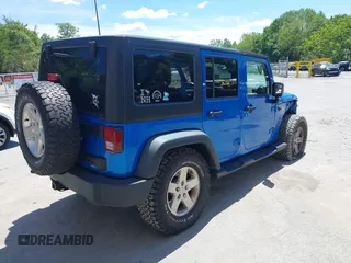 2015 Jeep Wrangler Unlimited Sport with VIN 1C4BJWDG2FL509773, listed as a IAAI auction lot 42753729 with 156,330 mi miles and . Bid and sale history available at DreamBid. Image 4.