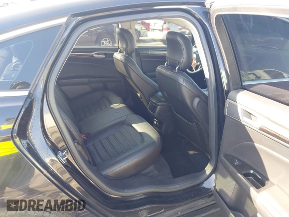 2013 Ford Fusion SE Hybrid with VIN 3FA6P0LU4DR325699, listed as a IAAI auction lot 41677237 with 129,004 mi miles. Bid and sale history available at carsss.com. Image 8.