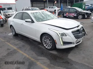 2015 Cadillac CTS Luxury RWD with VIN 1G6AR5SX2F0143450, listed as a IAAI auction lot 41408331 with 202,233 mi miles and . Bid and sale history available at DreamBid. Image 1.