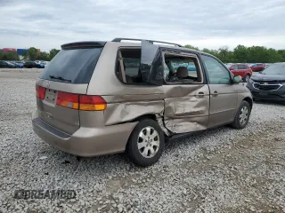 2003 Honda Odyssey EX z VIN 5FNRL186X3B152340, wystawiony jako Copart lot #57883455 z przebiegiem 214 008 mil mil oraz Szkoda całkowita • Salvage title. Historia ofert i sprzedaży dostępna na DreamBid. Obrazek 3.