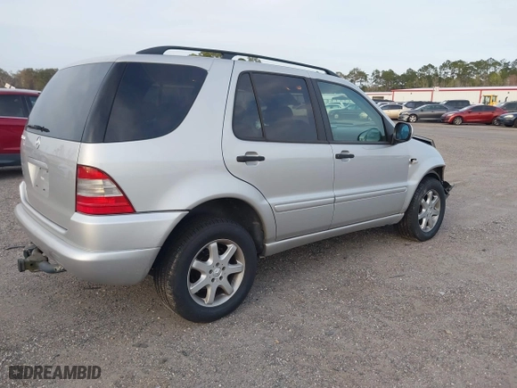 1999 Mercedes-Benz M-Class with VIN 4JGAB72EXXA131890, listed as a IAAI auction lot 41721001 with 168,969 mi miles. Bid and sale history available at carsss.com. Image 4.