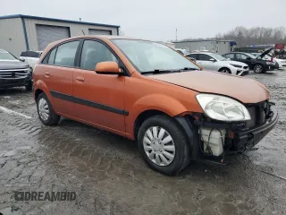 2009 Kia Rio LX with VIN KNADE243396530327, listed as a Copart auction lot 44631785 with 123,170 mi miles and Salvage Title. Bid and sale history available at carsss.com. Image 4.