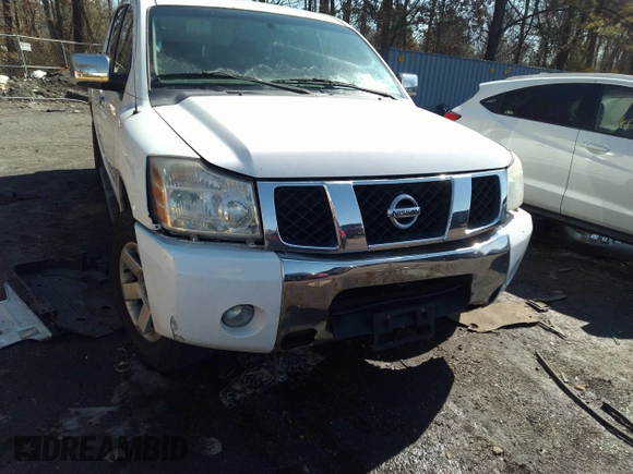 2005 Nissan Titan SE with VIN 1N6AA07B25N514643, listed as a IAAI auction lot 32638857 with 214,304 mi miles. Bid and sale history available at carsss.com. Image 6.