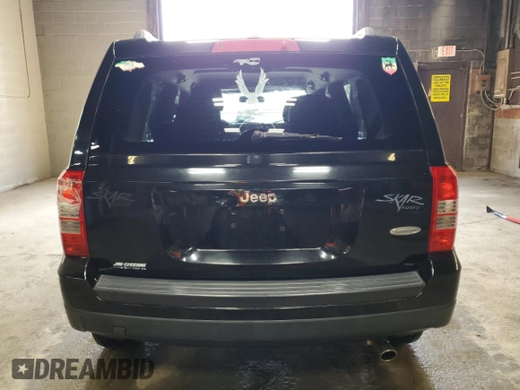 2014 Jeep Patriot Latitude with VIN 1C4NJPFB0ED890696, listed as a Copart auction lot 55581825 with 70,030 mi miles and Salvage title. Bid and sale history available at DreamBid. Image 6.