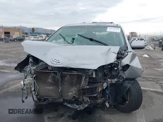 2012 Toyota Sienna XLE with VIN 5TDDK3DC9CS042847, listed as a IAAI auction lot 40970090 with 101,813 mi miles. Bid and sale history available at carsss.com. Image 6.