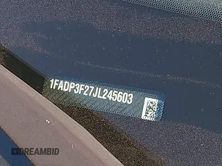 2018 Ford Focus SE z VIN 1FADP3F27JL245603, wystawiony jako IAAI lot #41773395 z przebiegiem 94 044 mil mil oraz . Historia ofert i sprzedaży dostępna na DreamBid. Obrazek 9.