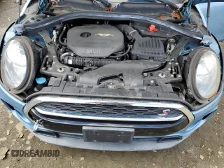 2017 MINI Clubman Cooper S z VIN WMWLU5C5XH2E83566, wystawiony jako Copart lot #57919305 z przebiegiem 89 983 mil mil oraz Tytuł czysty. Historia ofert i sprzedaży dostępna na DreamBid. Obrazek 11.