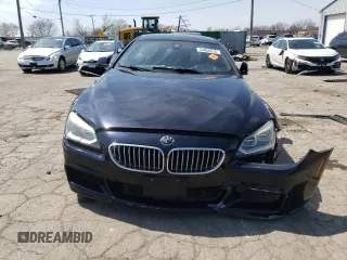 2015 BMW 6 Series 650i z VIN WBA6B2C50FGB99462, wystawiony jako Copart lot #54058515 z przebiegiem 96 662 mil mil oraz Tytuł czysty. Historia ofert i sprzedaży dostępna na DreamBid. Obrazek 5.