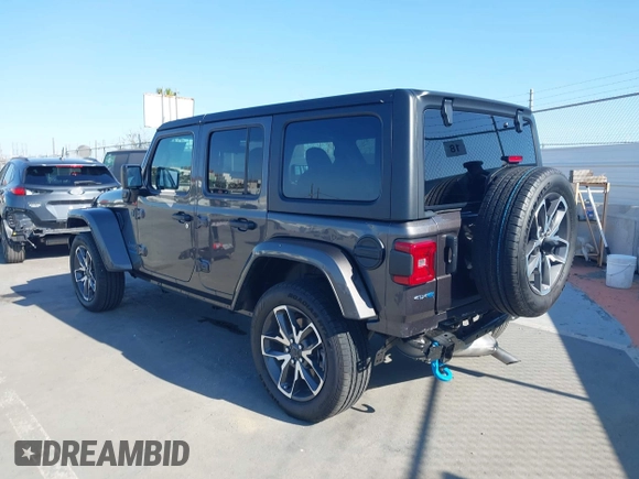 2024 Jeep Wrangler Sport S with VIN 1C4RJXN61RW192386, listed as a IAAI auction lot 42001810 with 7,426 mi miles and . Bid and sale history available at DreamBid. Image 3.