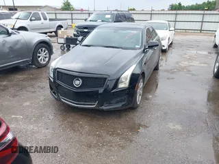 2014 Cadillac ATS Luxury AWD z VIN 1G6AH5R30E0150854, wystawiony jako IAAI lot #42422421 z przebiegiem 96 713 mil mil oraz . Historia ofert i sprzedaży dostępna na DreamBid. Obrazek 2.