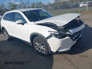 2018 Mazda CX-9 Touring with VIN JM3TCACYXJ0218600, listed as a IAAI auction lot 42032066 with 35,736 mi miles and . Bid and sale history available at carsss.com. Image 1.