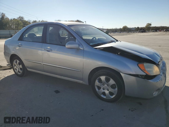 2006 Kia Spectra EX with VIN KNAFE121965372856, listed as a Copart auction lot 77365514 with 316,947 mi miles and Clean Title. Bid and sale history available at carsss.com. Image 4.
