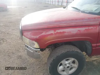 1999 Dodge 1500 z VIN 1B7HF16Y2XS185896, wystawiony jako IAAI lot #42251046 z przebiegiem 258 932 mil mil oraz . Historia ofert i sprzedaży dostępna na DreamBid. Obrazek 12.