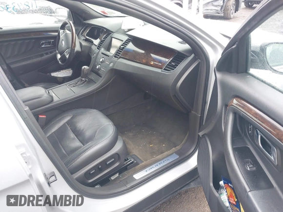 2014 Ford Taurus Limited with VIN 1FAHP2F81EG123933, listed as a IAAI auction lot 41843301 with 111,629 mi miles. Bid and sale history available at carsss.com. Image 5.
