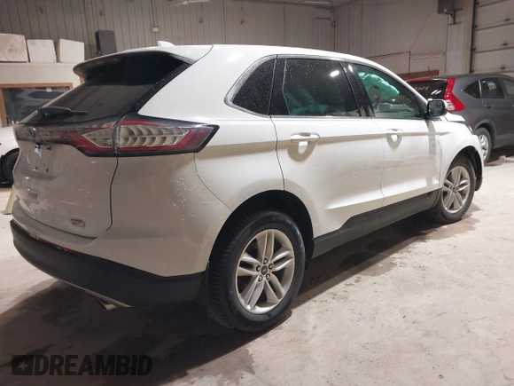 2016 Ford Edge SEL with VIN 2FMPK3J96GBC34607, listed as a IAAI auction lot 41909502 with 76,641 mi miles. Bid and sale history available at carsss.com. Image 4.