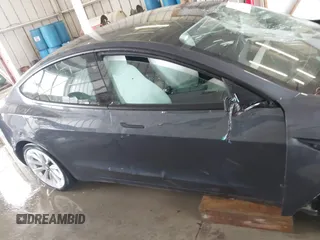 2023 Tesla Model 3 z VIN 5YJ3E1EA2PF591661, wystawiony jako IAAI lot #42014086 z przebiegiem 13 945 mil mil oraz . Historia ofert i sprzedaży dostępna na DreamBid. Obrazek 13.
