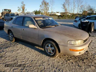 1992 Toyota Camry LE with VIN 4T1SK12E1NU127255, listed as a Copart auction lot 75554584 with 385,507 mi miles and Salvage Title. Bid and sale history available at carsss.com. Image 4.