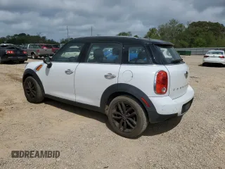 2015 MINI Countryman with VIN WMWZB3C52FWM33204, listed as a Copart auction lot 51680405 with 154,839 mi miles and Salvage Title. Bid and sale history available at DreamBid. Image 2.