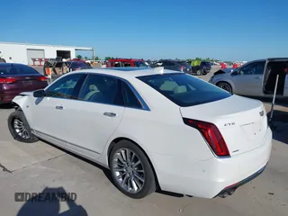 2018 Cadillac CT6 Luxury AWD z VIN 1G6KD5RS9JU151575, wystawiony jako IAAI lot #42078361 z przebiegiem 28 187 mil mil oraz . Historia ofert i sprzedaży dostępna na DreamBid. Obrazek 3.