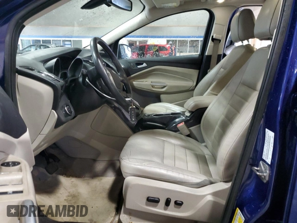2014 Ford Escape Titanium with VIN 1FMCU9JX8EUC41088, listed as a Copart auction lot 52568435 with 114,907 mi miles and Salvage Title. Bid and sale history available at DreamBid. Image 7.