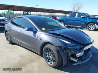 2022 Tesla Model 3 Long Range with VIN 5YJ3E1EB9NF197127, listed as a IAAI auction lot 41366323 with NaN miles. Bid and sale history available at carsss.com. Image 1.